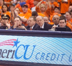 Pete Moore at a 2010 Syracuse men’s basketball game at the Carrier Dome: Moore, former SID Pete Korzyno and SIDEARM President Jeff Rubin.